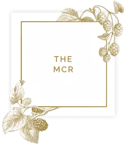 Sign saying the mcr in square with floral decorations