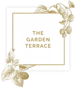Sign saying the garden terrace in square with floral decorations