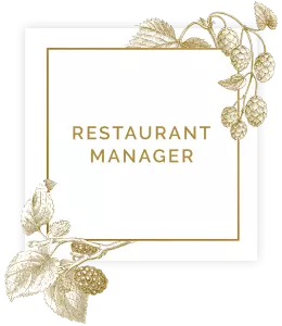 Sign saying restaurant manager in square with floral decorations